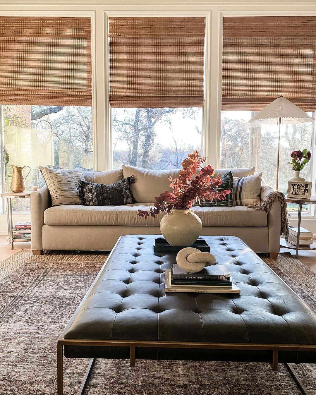 Round End Tables Beside Beige Sofa