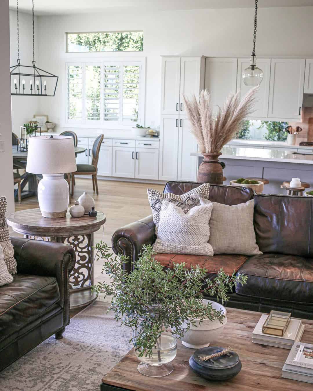 Embellished End Table Between Leather Sofas