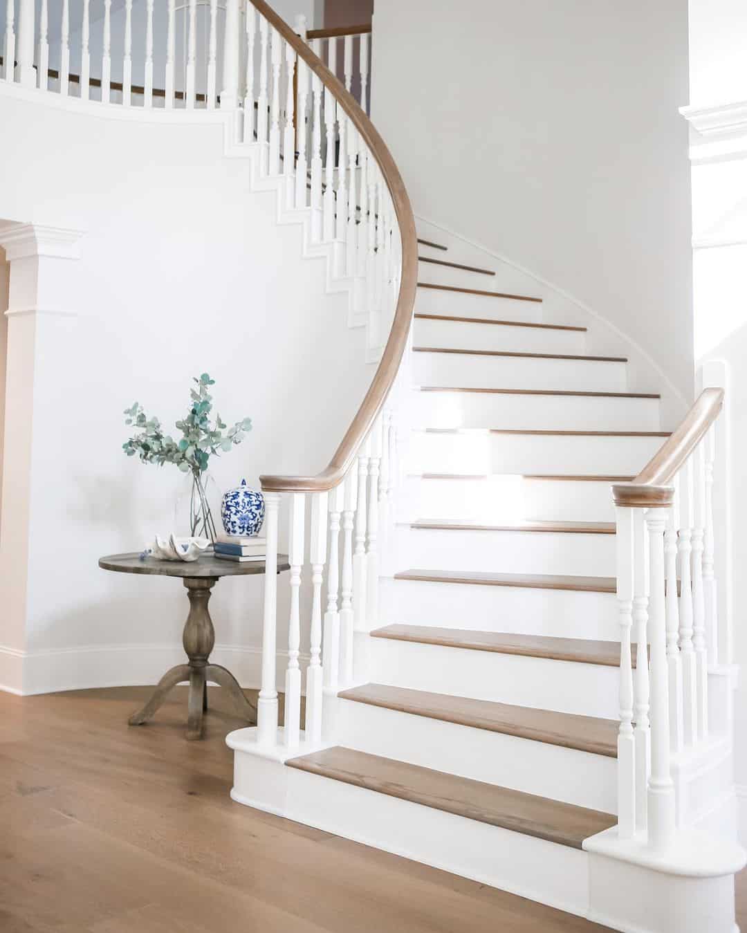 White Baseboard Contrasts with a Medium-Dark Wood Floor