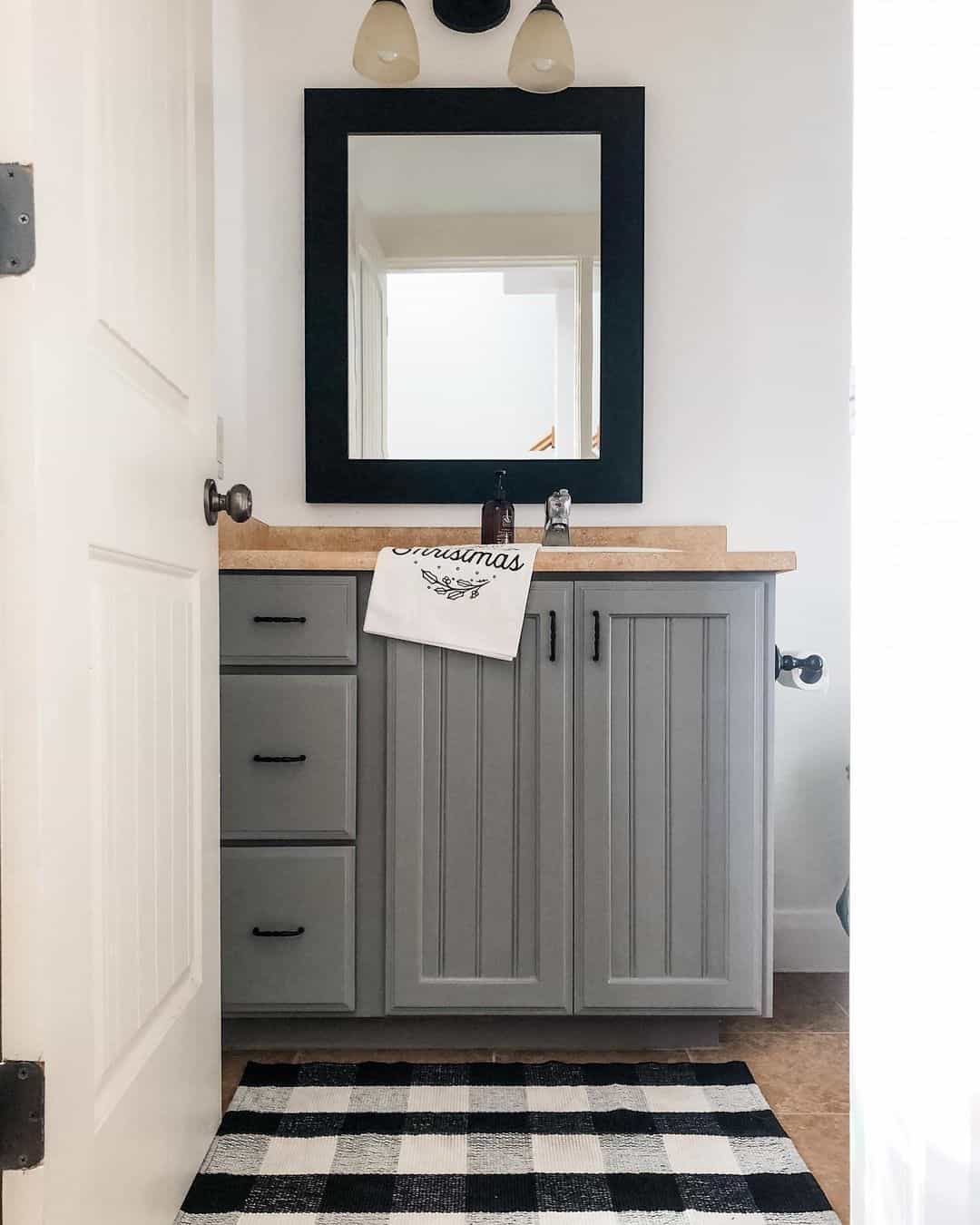 Wood Colored Countertop on a Gray Bathroom Cabinet