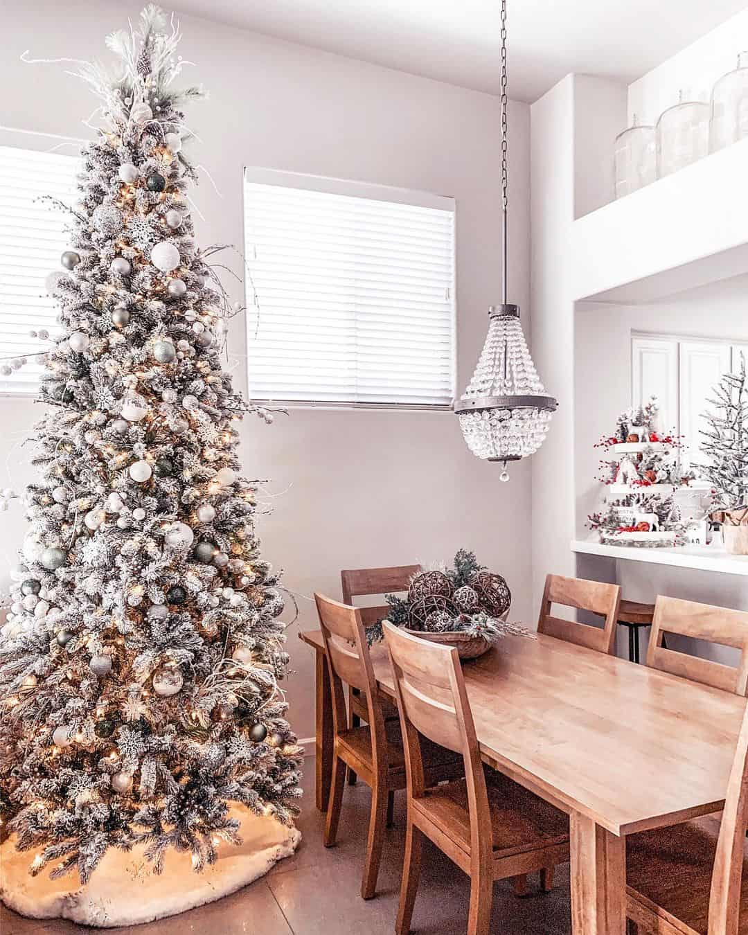 Wooden Dining Room Table under Glass Pendant Chandelier